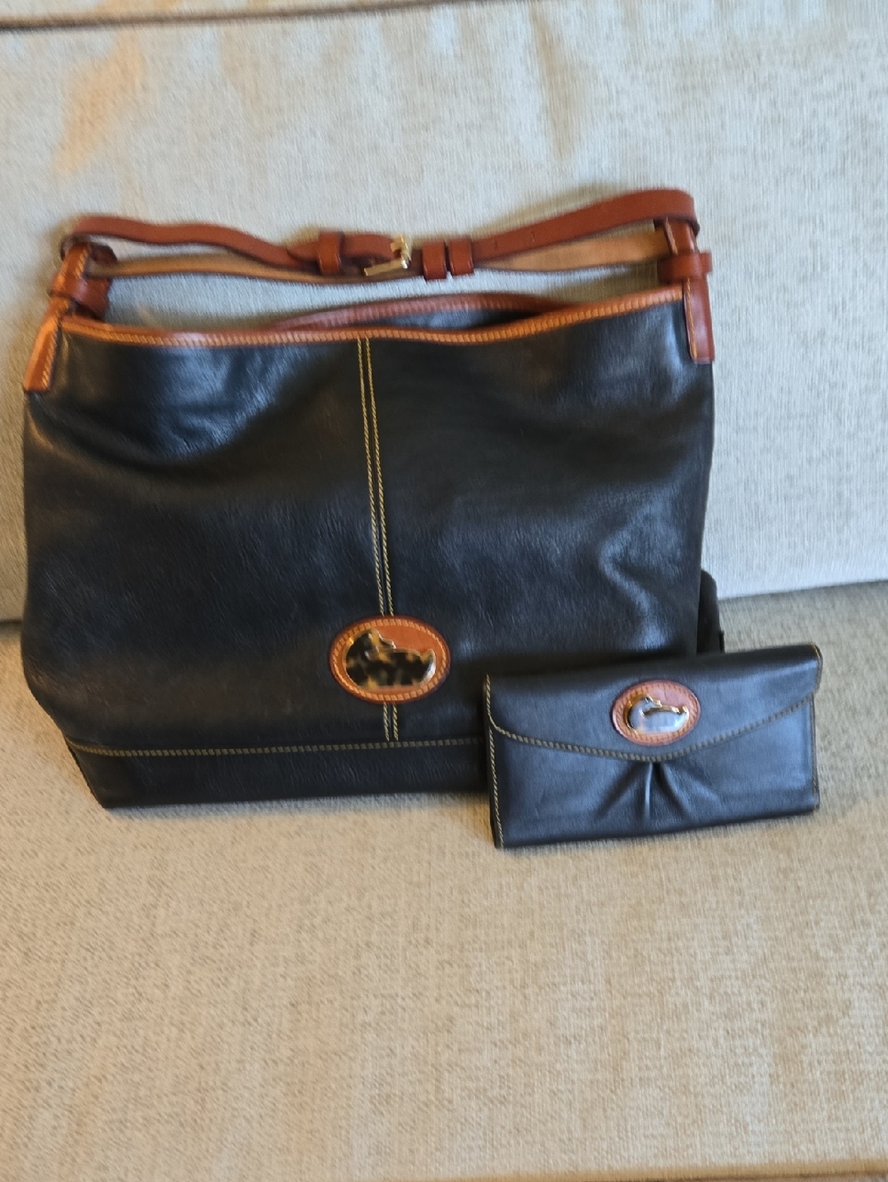 Dooney & Bourke Black Leather Shoulder Bag with Brown Trim and Matching Wallet